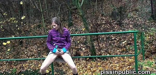  Cute girls expose peeing pussies and take a leak near the forest